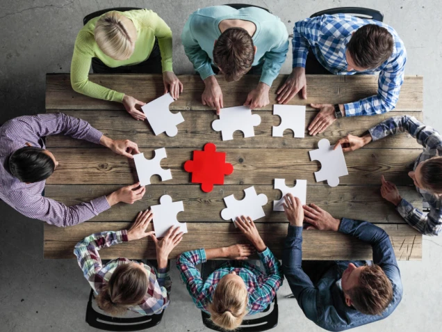 Business people and puzzle